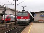 1144 264-7 als Regionalzug aus St.Plten auf Gleis 3 in Wien Htteldorf und Regionalzug auf Gleis 1 nach St.