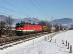 Die 1144 260 und die 1116 144 mit einem Güterzug am 30.01.2016 unterwegs bei St. Johann in Tirol.