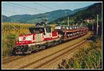 1163 018 mit Güterzug bei Oberaich am 22.09.1999.