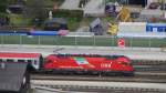 1216 014 mit EC 82  DB-BB EuroCity  (Innsbruck Hbf->Mnchen Hbf) in Brixlegg.(4.4.2012)