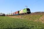 1216 954 Hödlmayr mit einem Containerzug bei Himmelstadt am 07.04.2018
