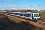 4020 206, unterwegs mit S Bahnzug nach Mdling. Die Aufnahme entstand am 10.04.2013 kurz nach der Haltestelle in Helmahof.