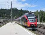 Ein 4024er der S-Bahn Tirol erreicht am 03. August 2012 als S-Bahn nach Telfs-Pfaffenhofen den Bahnhof Kufstein.