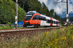 4023 010-4 fährt als S3 5062 (Salzburg Liefering - Schwarzach-St. Veit), fährt nahe Mitterberghütten vorüber.
Aufgenommen am 7.8.2016.