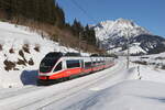 4024 082 auf dem Weg nach Wörgl am 12. Februar 2022 bei Hochfilzen.