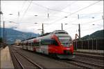 4024 076 verlsst als R 5116 von Innsbruck Hbf komment den Bahnhof Schwaz Richtung Rosenheim und wird in wenigen Minuten vom IC 88  Leonardo da Vinci  berholt..... (04.07.2008)
