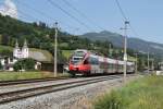 4024 080-6 mit S 5026 St. Johann in Tirol-Wrgl Hauptbahnhof bei Brixen im Thale am 22-7-2013.