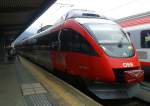 4024 087-1 als S3 5255 (Steinach in Tirol - Hall in Tirol) am 15.5.2015 beim Halt in Innsbruck Hbf.