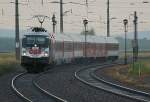 1116 246  Bundesheer  im Regenschauer mit IC 403  Saris  (Wien - Kosice) am 11.06.2009 kurz vor Gramatneusiedl.