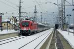 1116 133 der ÖBB mit EC 112 (Klagenfurt-Frankfurt) beim Halt im Bahnhof Spittal-Millstättersee.