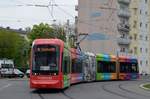 Graz Linien Variobahn WN 243 mit FH JOANNEUM Vollwerbung auf der Linie 10 (1/7) kurz nach der Haltestelle Asperngasse, 13.04.2017