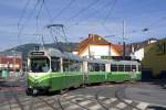 Am 7. Juni 2013 ist TW 529 auf der Linie 1 unterwegs und biegt gerade von der Alten Poststraße in die Eggenberger Straße ein. 