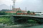 Straßenbahn Innsbruck__Mittelgebirgsbahn__Zug der Linie 6 auf der Sill-Brücke.__20-08-1973