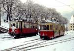 Anfang Januar 1980 treffen sich zwei Fahrzeuggenerationen der Innsbrucker Straßenbahn im Bergiselbahnhof: Einer der  Haller Triebwagen  (Nr. 2-4) und der von der Hagener Straßenbahn übernommene Tw 84
