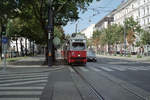 Wien Wiener Linien SL 1 (E1 4848) I, Innere Stadt, Schottenring / Börsegasse am 4. August 2010. - Scan von einem Farbnegativ. Film: Fuji S-200. Kamera: Leica CL.