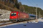 1216 228 mit Railjet in Langenwang am 6.12.2017.