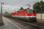 1144 119 + 1144 268 fahren am 12.06.2016 mit einem Güterzug durch die Haltestelle Allerheiligen Mürzhofen.
