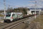 1116 130 mit Güterzug bei Spielberg am 15.03.2016.