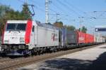 Kombiverkehr 185 664 mit KLV Ekol-Zug bei der Durchfahrt in Elsbethen am 04.10.2013 in Richtung Bischofshofen.