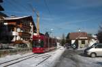 IVB 354 am 04.01.2011 bei Abfahrt in der Station Telfes.