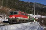 1142 608 + 470 504 mit Güterzug bei Spital am Semmering am 6.12.2017.