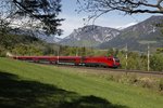 1116 228 zieht am 26.04.2016 einen Railjet bei Eichberg auf den Semmering.