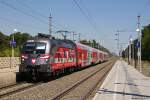 1116 138  Heeressport  mit R2329 (Breclav - Payerbach-Reichenau) am 03.08.2013 beim Halt in St.Egyden.