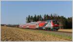 218 256 mit dem als S6 verkehrenden R 4377 von Graz ber Werndorf nach Wies-Eibiswald, am 30.3.2011 kurz nach der Haltestelle Hollenegg aufgenommen.