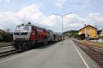 Die Station Wies - Eibiswald der Graz-Kflach-Bahn am 29.07.2011. 218 256-6 fhrt in Krze Richtung Graz ab.