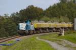 Die Aufnahme zeigt den vollen Abraumzug vom Bau des Koralmtunnels mit der DH1700.2 kurz vor dem Bahnhof von Deutschlandsberg. (25.09.2013)