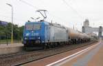 LTE 185 529-5 passiert mit einem Gaskesselwagen-Zug den Bahnhof Gramatneusiedl in Richtung Wien. Aufgenommen am 17.05.2013.