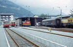 Bahnhof Schruns der Montafonerbahn am 15.07.1972. Zu sehen sind ET10 103, ES10 203, V10 021, Kurswagen und Wagen für den Dampfzug. Scanbild 52, 3M dia.