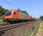 1216 903-5 der RTS mit Bauzug in Fahrtrichtung Süden. Aufgenommen bei Wehretal-Reichensachsen am 09.06.2014.