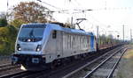 SETG - Salzburger Eisenbahn TransportLogistik GmbH mit Rpool  187 303-3  [NVR-Number: 91 80 6187 303-3 D-Rpool] und einem Leerzug Drehgestell-Flachwagen für Stammholz-Transporte Richtung Frankfurt/Oder am 18.10.18 Berlin-Hirschgarten.