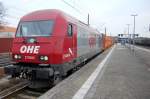 OHE Osthannoversche Eisenbahnen AG Die 270080 (223 101-7) der Osthannoversche Eisenbahnen AG zieht einen Containerzug durch Rathenow. 19.03.2010