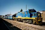 659 mit Touristenzug nach Cuzco im Bf. Puno am 22. Oktober 2003