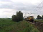 plan-v 412 und 860 mit Regionalzug 16030 Den Bosch-Utrecht CS bei Houten am 11-6-2010.