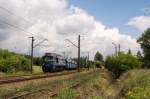 ST44-1241 der PKP Cargo mit dem leeren Falls-Wagen in Libiąż bei Kraków{Krakau)am 14.06.2014.