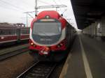 EN57-1413 von Kolej Wielkopolska in Bahnhof Zbąszynek