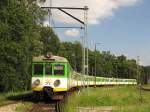 Nachdem EN57-1397 + EN57-1599 den Betriebshof Warszawa Grochw verlassen hat, fhrt er nach Warszawa Wschodnia, um eine Reise nach Skierniewice als KM-229 zu beginnen (13.06.2010).