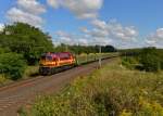 M62M 016 (630 266) mit einem Holzzug am 27.08.2014 bei Slubice.