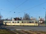 Fahrzeug 697 der Straßenbahn Poznan biegt in die Wielkopolska ab - 23.2.2014, Poznan.