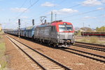 PKP Vectron EU46-505 (5370 017-3) mit einem PKP Cargo Falns Ganzzug in Berlin-Schönefeld Flughafen und fuhr weiter in Richtung Glasower Damm.