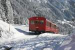 RB Rigi Bahnen Der BDhe 4/4 Nr. 5 aus 1964 ist im Winter praktisch t�glich auf der Vitznau-Rigi-Bahn im Dauereinsatz. Am Nachmittag des 20.12.2009 hat der Triebwagen zusammen mit den durchaus als nostalgisch zu bezeichnenden Vorstellwagen 7 und 8 die Station Kaltbad talw�rts Richtung Vitznau verlassen. 