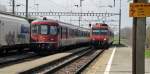 Neben dem abgestellten Regio (Estavayer-le-Lac - Romont) trifft am 07.04.10 ...