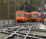 RBS Regionalverkehr Bern-Solothurn Der  Be 4/12 n�50 als S 9 nach Unterzollikofen begegnet den neu gestalten Be 4/12 N� 70 der in der Gegenrichtung unterwegs ist bei Worblaufen am 26. Februar 2010.
