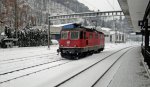 Im verschneiten Bahnhof Wolhusen wartet die Re 4/4 11336 am ... Im verschneiten Bahnhof Wolhusen wartet die Re 4/4 11336 am ...