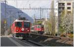 re-4-4-ii-re-420 Die kleine und die grosse Rote in Chur Wiesental. Ge 4/4 II 618 'Berg�n' und Re 4/4 II 11217. (19.04.2010)