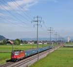 Re 4/4 II 11130 mit EW II-Pendel bei Kiesen am ...