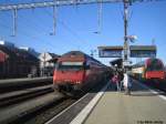 re-460-mit-zugen Re 460 014-4 ''Val-du-Trient'' am 25.11.09 mit dem IR 1767 nach Chur in Pf�ffikon SZ. 
